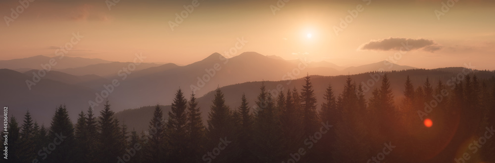 Sunset over the carpathian mountain ridge