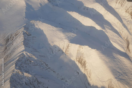 Nature scene - Aerial top view of Snow Mountain of himalaya mountains on sunny day winter season at Leh Ladakh , Jammu and Kashmir , India  - Beautiful White snow nature Texture Background 