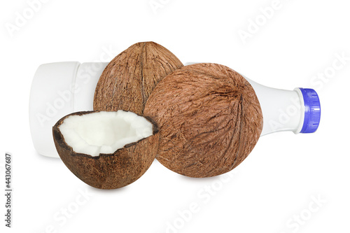 Bottle of milk, coconuts isolated on white background