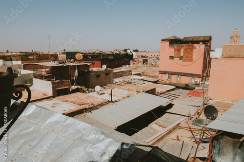 Shabby roofs of houses in ghetto photo