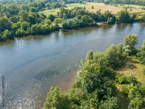 River bank in summer. Aerial drone view.