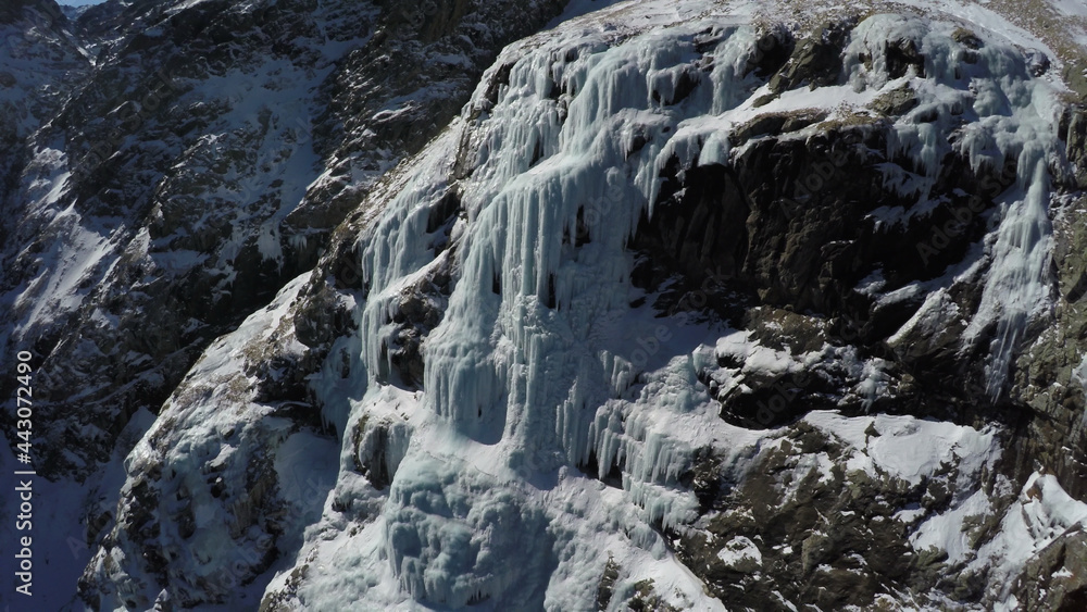Caucasus, Ossetia. Midagrabin gorge. Frozen waterfalls on the slope of Mount Donchenta. 