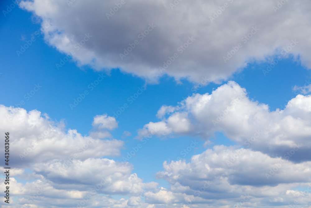 White clouds against blue sky