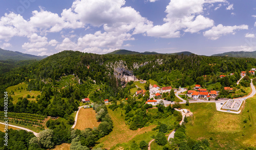 Predjama castle is a unique cave what built in a cave entrance. Renessiance style fortress from 12th century in Slovenia Julian apls Mountains. One of the biggest cave castles of the world photo