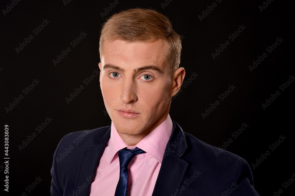 Close up portrait of young businessman posing in studio Close up portrait of young businessman posing in studio