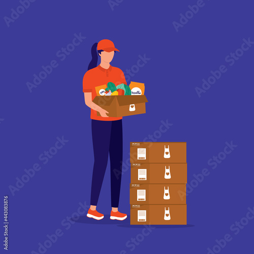 Young Delivery Woman In Uniform With Polo Shirt And Cap Preparing Boxes With Fresh Food And Raw Ingredients For Delivery. Meal Kits Delivery Service.