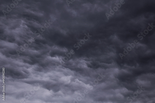 Epic Dramatic Storm sky, dark grey rainy clouds abstract background texture, thunderstorm