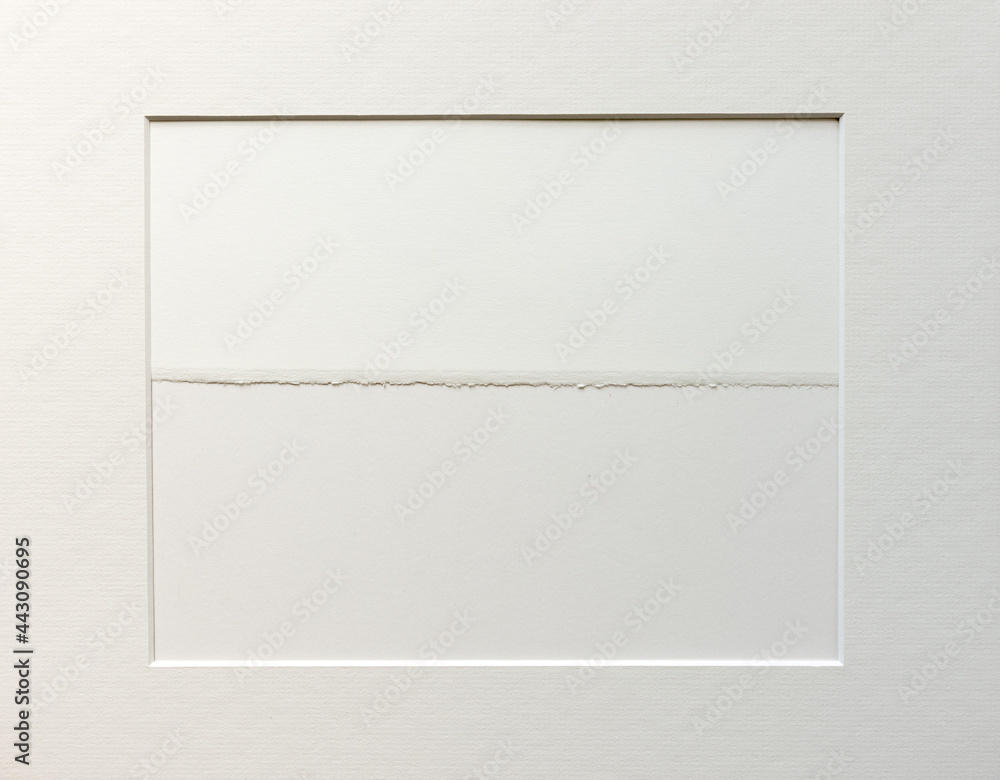 light gray accent frame overlay with textured, used art paper - centre focus on deckle edge - photographed top-down with ambient light light gray accent frame overlay with textured, used art paper - centre focus on deckle edge - photographed top-down with ambient light