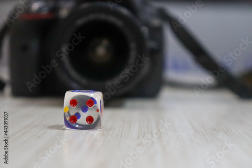 Dice and Camera on the table photo