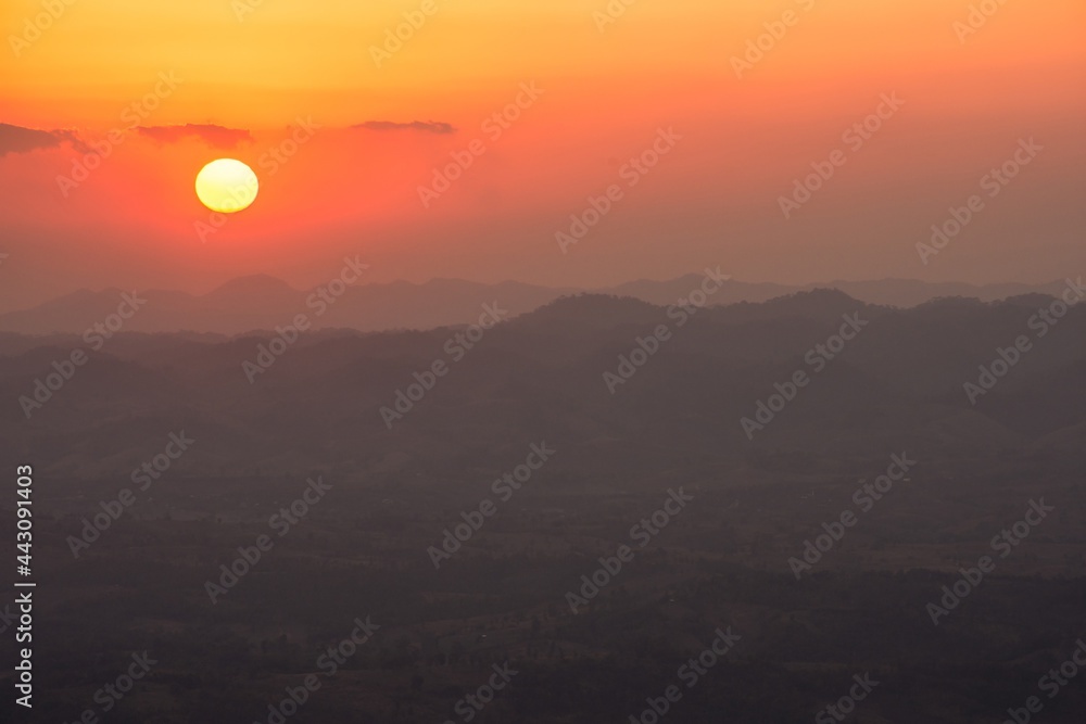 The sunrise and mountain view.Taken in warm filter and soft focus effect.