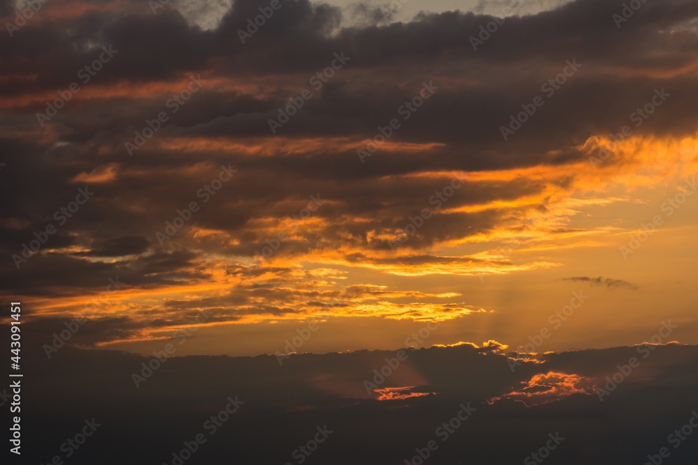 Cloudy sky with golden sunlight, selective focus Cloudy sky with golden sunlight, selective focus