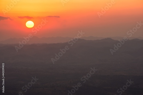 The sunrise and mountain view.Taken in warm filter and soft focus effect.