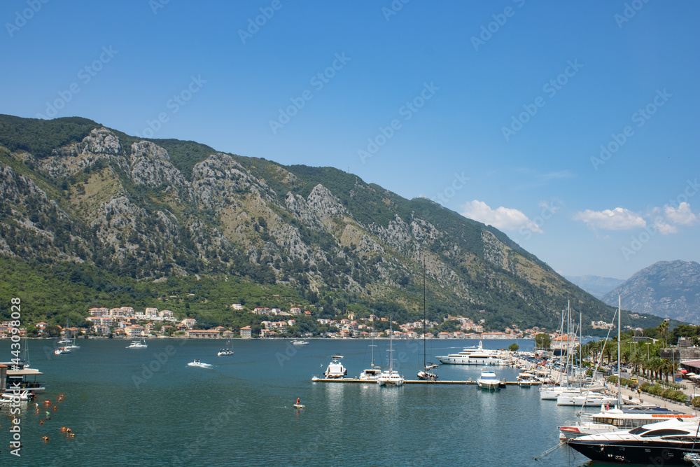 Beautiful sea and mountain views under the bright blue sky. View to the Kotor bay Montenegro to Adriatic sea.