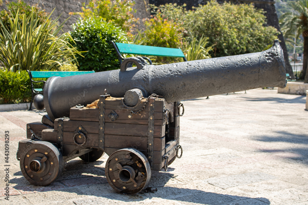 Old military cannon for shooting. Medieval weapons.
Ancient artillery. Kotor Montenegro.