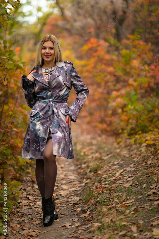 beautiful girl in autumn beautiful foliage in the forest in the tunnel beautiful girl in autumn beautiful foliage in the forest in the tunnel