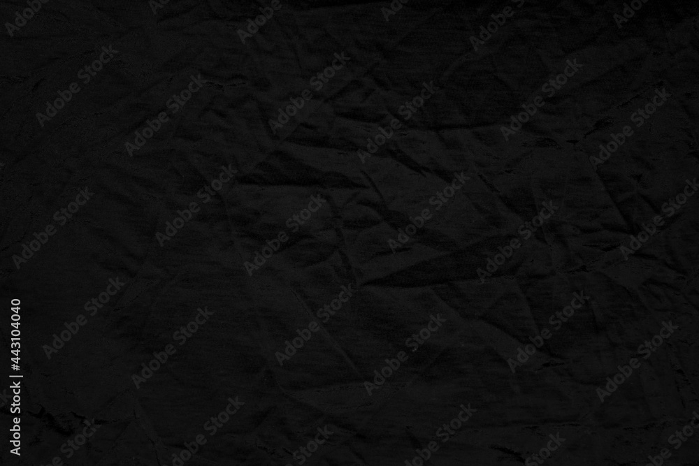 black crumpled paper background black crumpled paper background