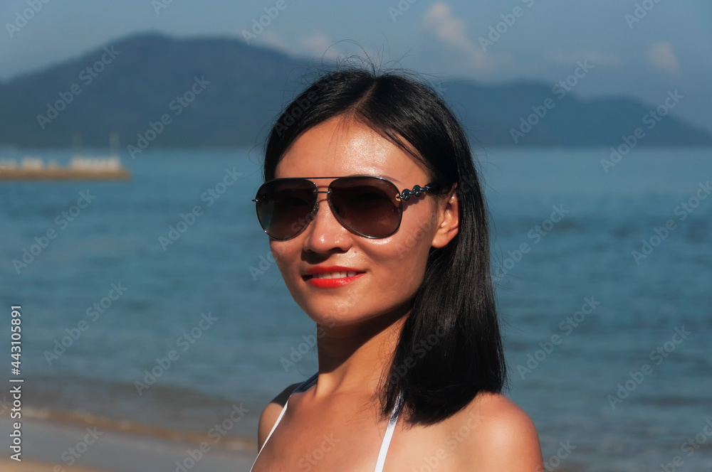 chinese woman on a beach in penang malaysia chinese woman on a beach in penang malaysia