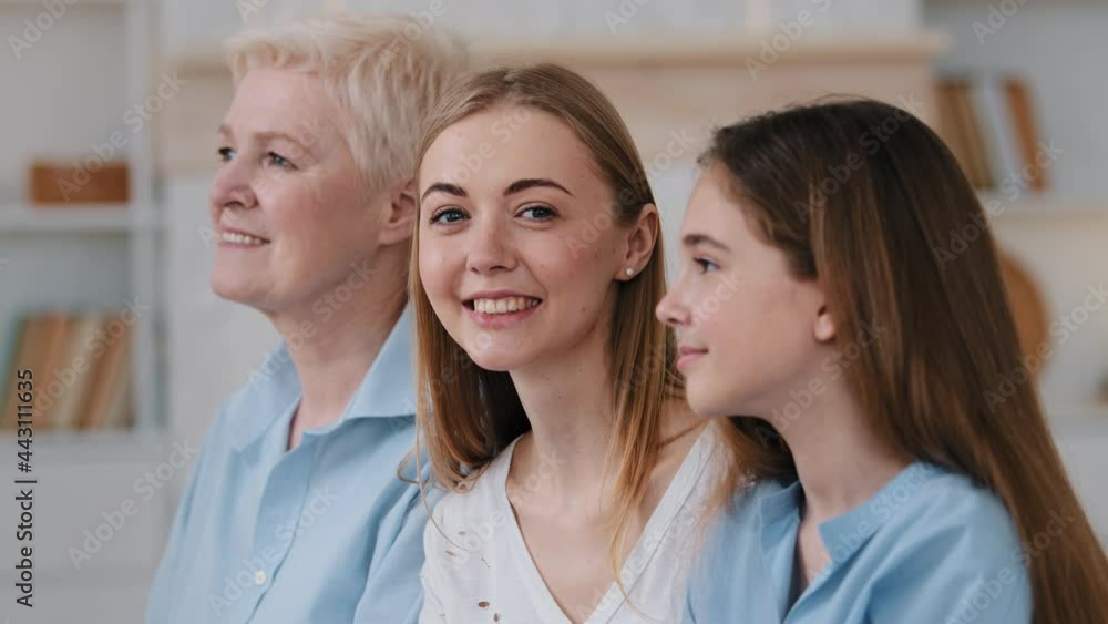 Intergenerational family profile side portrait. Elderly female, grown up daughter and little granddaughter. Adult woman looking at camera dreaming of happy future with mom and daughter. 3 generation Intergenerational family profile side portrait. Elderly female, grown up daughter and little granddaughter. Adult woman looking at camera dreaming of happy future with mom and daughter. 3 generation