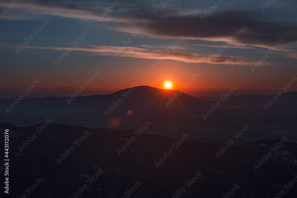 Sunset Behind Mountain