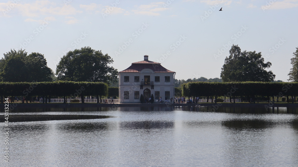 Obraz premium vintage building in summer park near lake