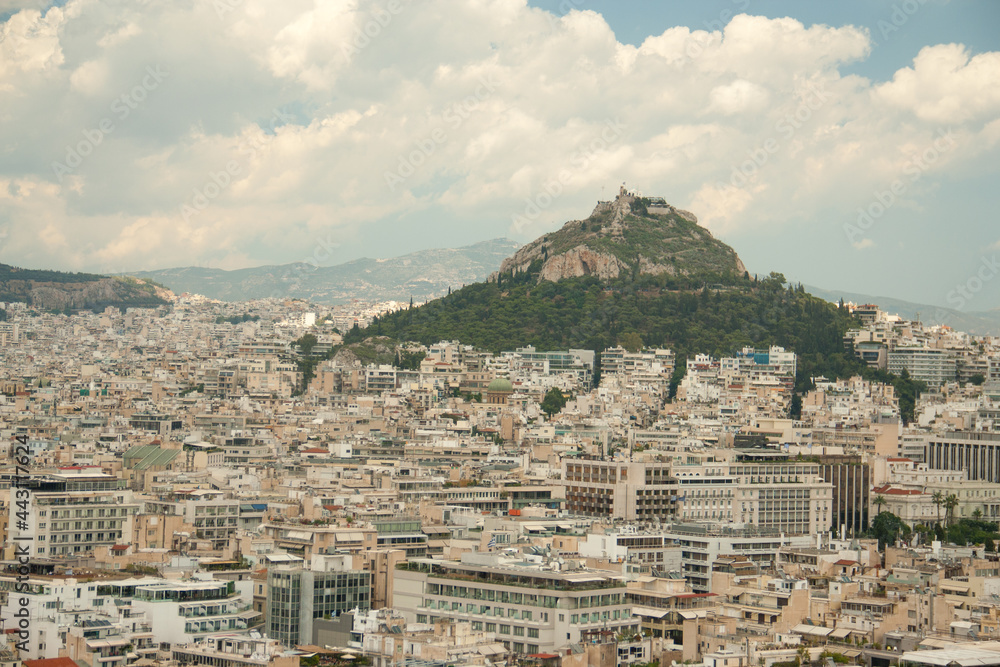 Cityscape of Athens and Lycabettus hill, also known as Lykabettos, Lycabettos or Lykavittos.