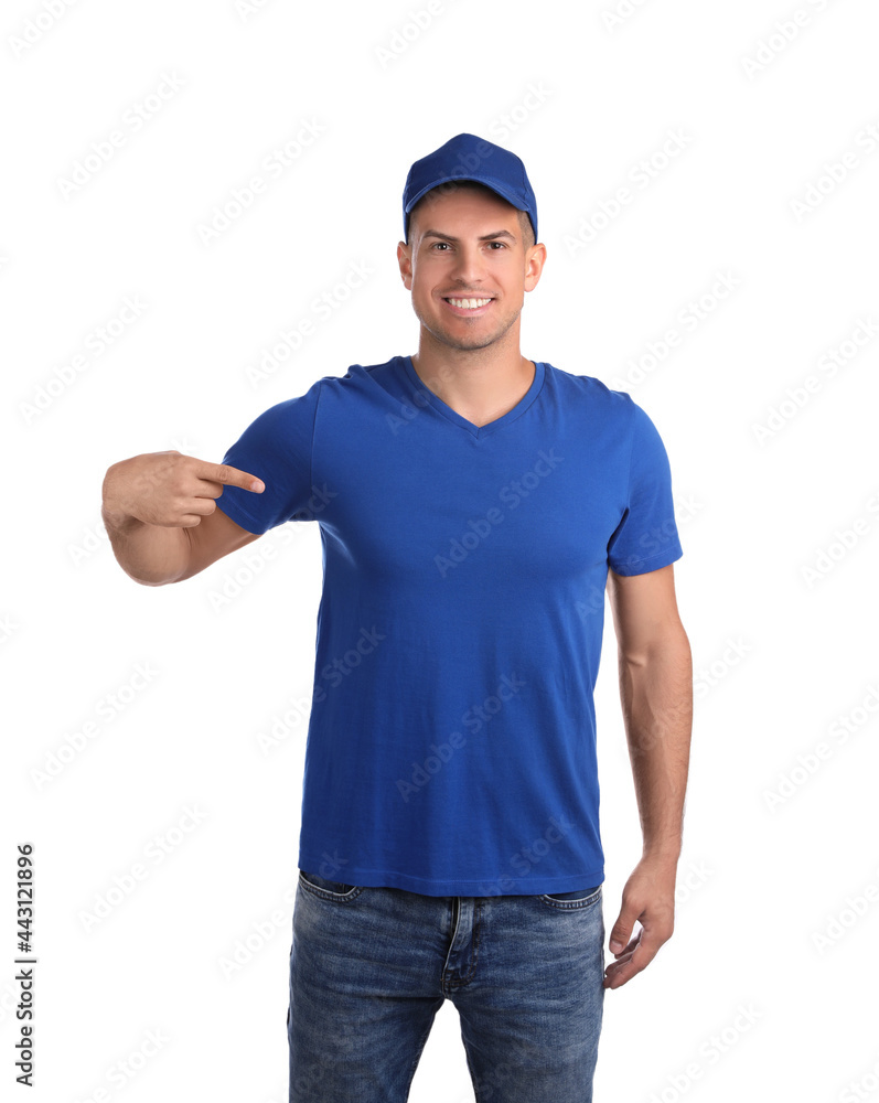 Naklejka premium Happy man in blue cap and tshirt on white background. Mockup for design