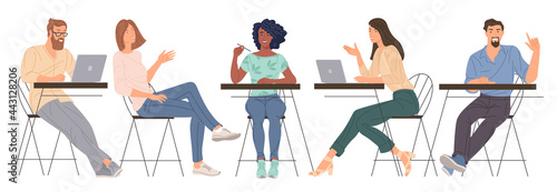 Young men and women working in office