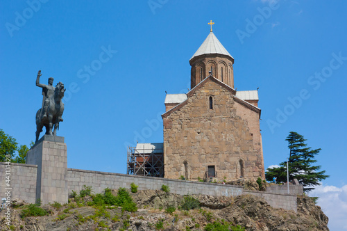 Tbilisi, Georgia - August 7,2013: Virgin Mary Metekhi church with Vakhtang I Gorgasali statue in Tbilisi, Georgia