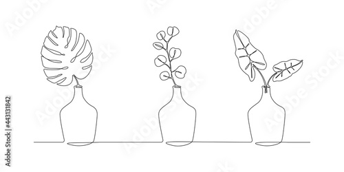 One continuous line drawing of leaves plants in vases. Stylish scandinavian house flowers in simple linear style. Editable stroke Vector illustration