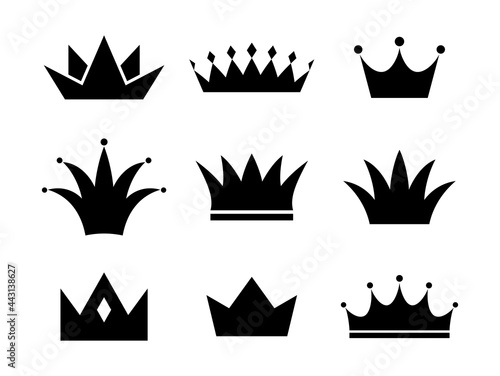 Set of black crowns on a white background. Vector icons.
