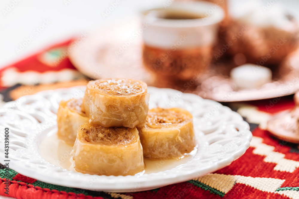 Bosnian and Turkish dessert called Ruzica served in a traditional way with coffee