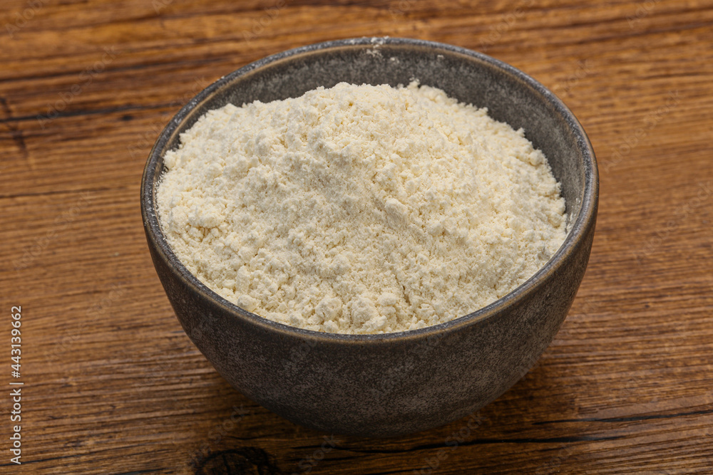 Wheat flour heap in the bowl Wheat flour heap in the bowl