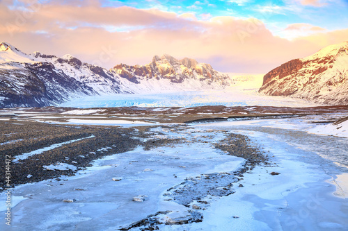 South Iceland Route 1 road snowy Winter during sunset.