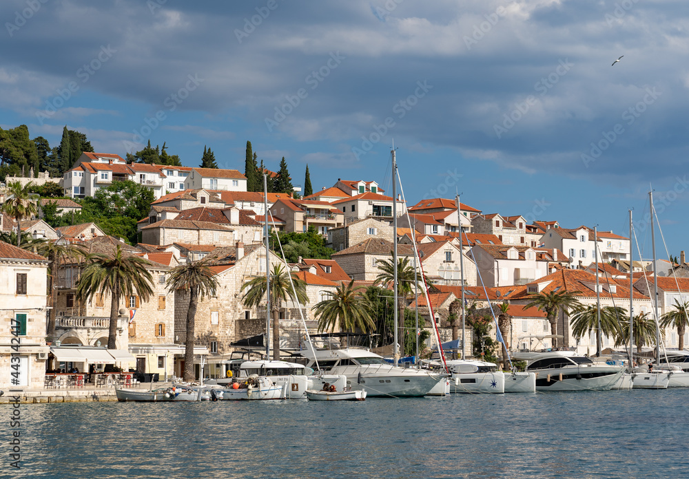 Beautiful Mediterranean town on the seafront with many white houses with red roofs