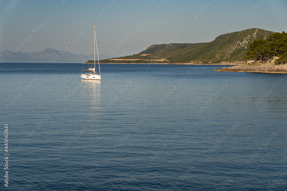 View of the sea and the distant stone shores of the island of Hvar in Croatia