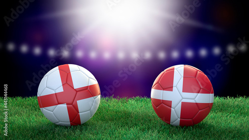 Billede på lærred Two soccer balls in flags colors on stadium blurred background