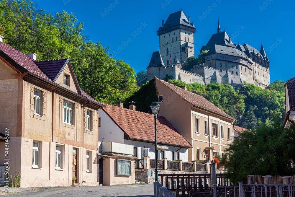 Castle on the top of a hill from the street of Karlstejn in  Czech Republic