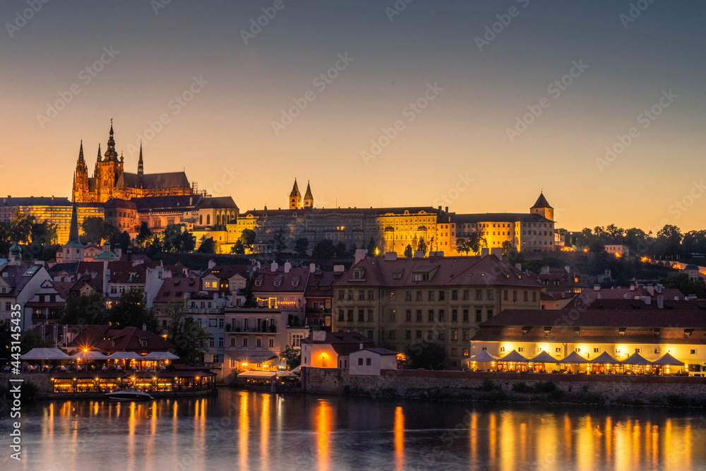PRAGUE, CZECH REPUBLIC, 31 JULY 2020: Amazing sunset over the castle of Prague and the Vltava river