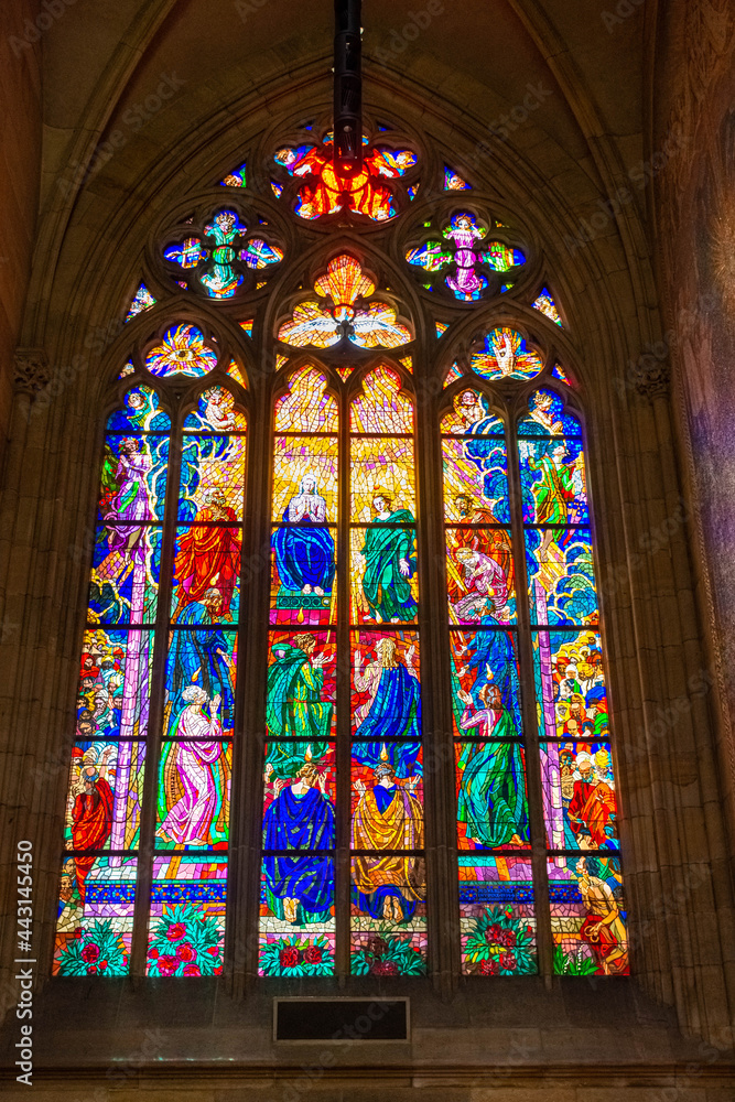 PRAGUE, CZECH REPUBLIC, 31 JULY 2020: Colorful Stained glass windows inside St. Vitus Cathedral