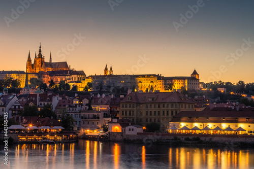 PRAGUE, CZECH REPUBLIC, 31 JULY 2020: Amazing sunset over the castle of Prague and the Vltava river