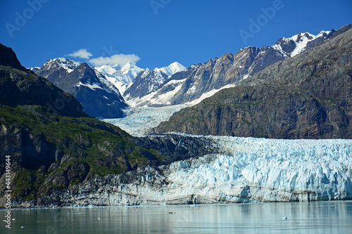 Spectacular Margerie glacier and surrounding mountain peaks of the fairweather range on a sunny summer day in glacier bay national park, southeast alaska