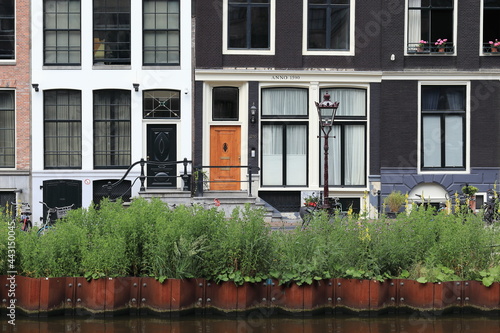 Photography Amsterdam Singel Canal House Facades with Entrance Steps and Canal Quay Walls Ve