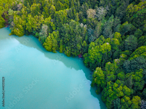 Aerial shot of congro lake with turquoise waters in Sao Miguel, Azores.