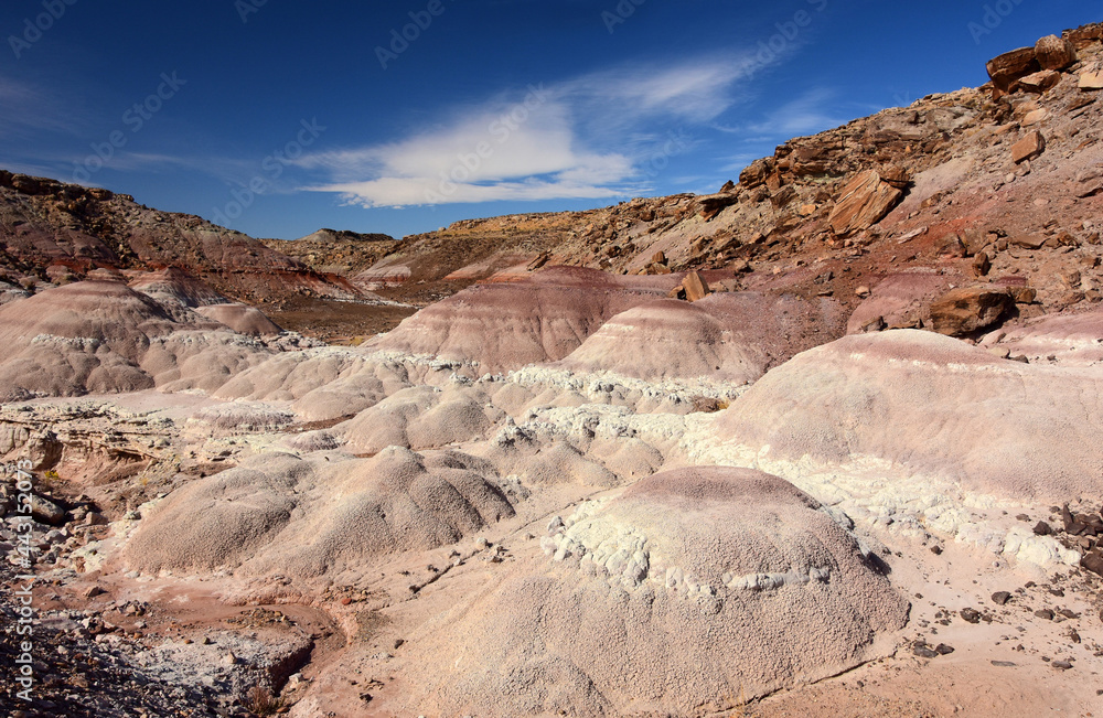 the colorful red and purple, eroded  bentonite hills on a sunny day  near  fossil point in the san rafael swell south of green river, utah