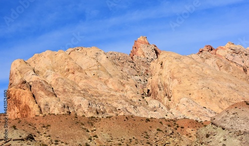 the  colorful flatiron rock formations in the san rafael reef near uneva canyon on a sunny day, near green river, utah photo