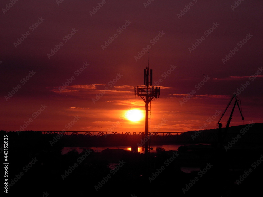 Fototapeta premium Red morning sky and a sun