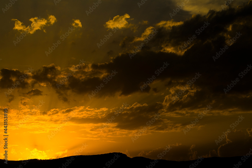 Fototapeta premium sunset in the mountains. Sky. Background. Photo. Summer time. 