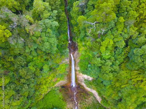 Aerial drone view of a huge tropical waterfall in Sao Miguel, Azores islands.