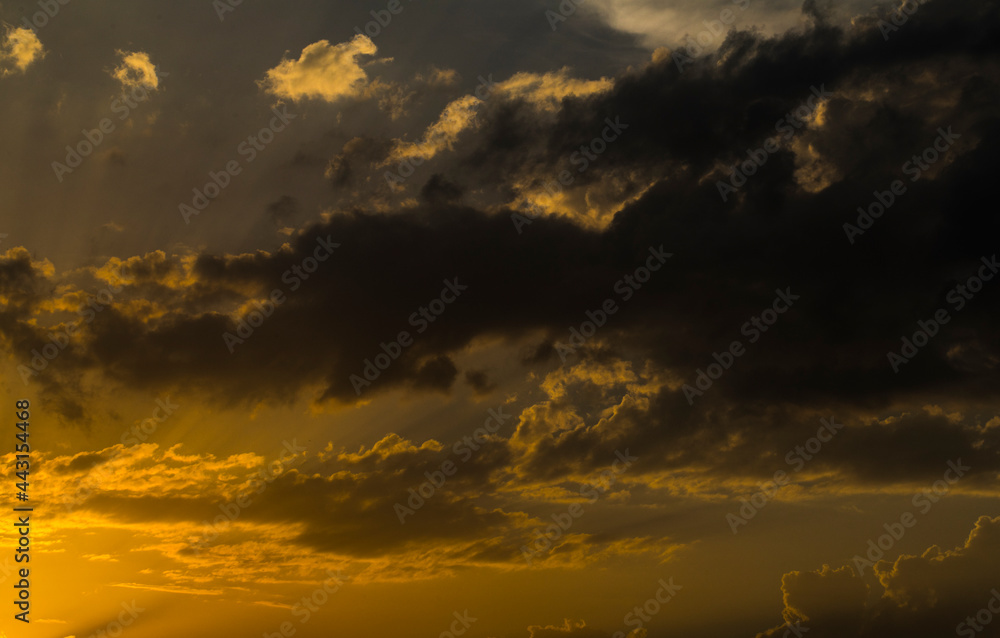 time lapse clouds. Sunset. Background. Light. Photo. Dark. 