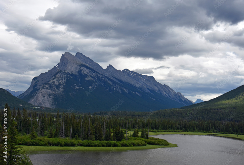 dramatic mount rundle across the vermilion lakes on a stormy day in  banff national park, alberta, canada